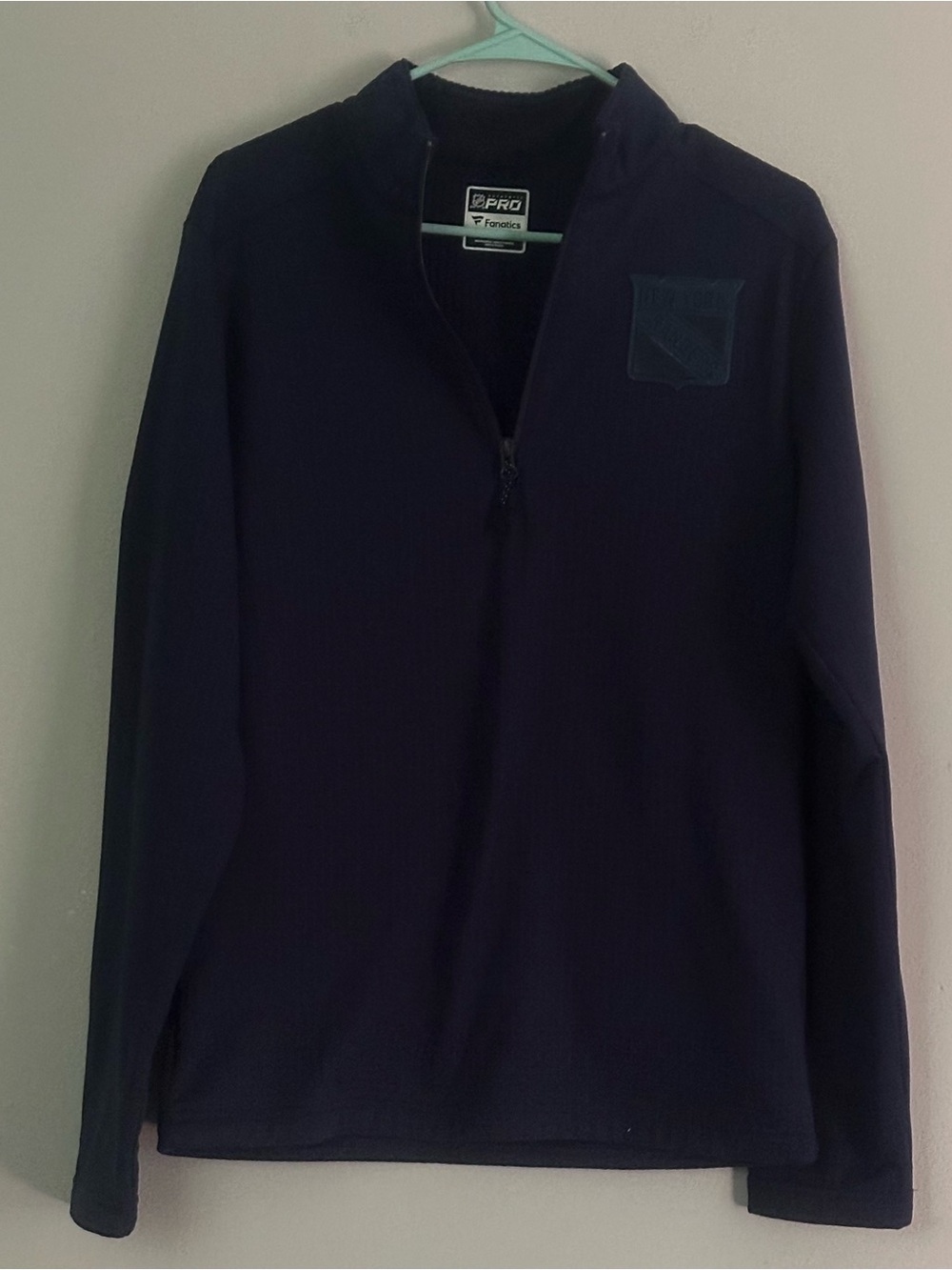 Fanatics NHL New York
Rangers Authentic Pro Rink
Quarter-Zip Pullover